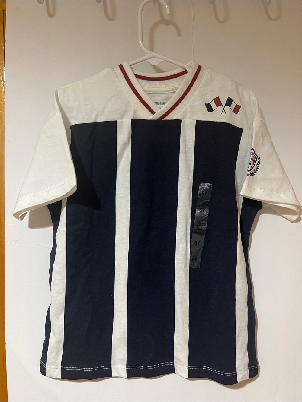 The Children's Place Navy & White Striped V‑Neck Jersey with Flag Accents